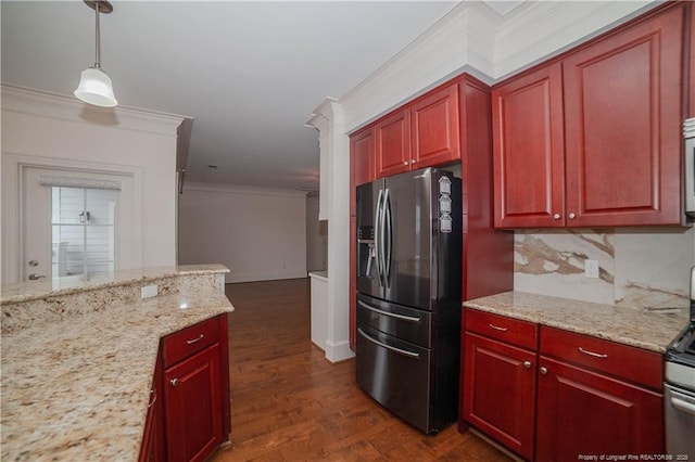 kitchen featuring reddish brown cabinets, dark wood finished floors, decorative light fixtures, crown molding, and stainless steel refrigerator with ice dispenser