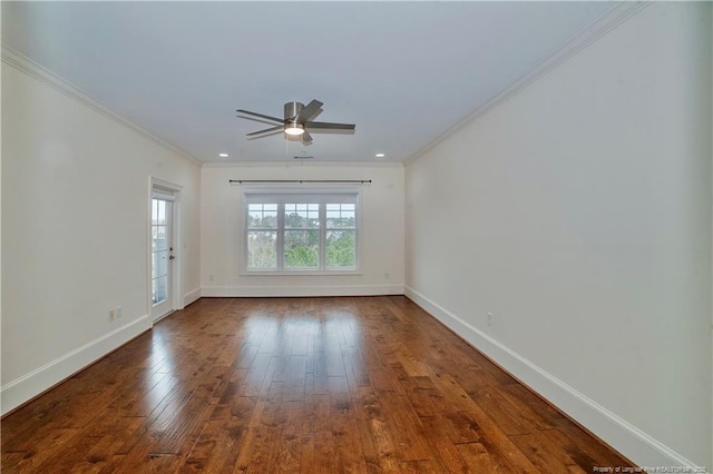 spare room with ceiling fan, ornamental molding, wood-type flooring, and baseboards