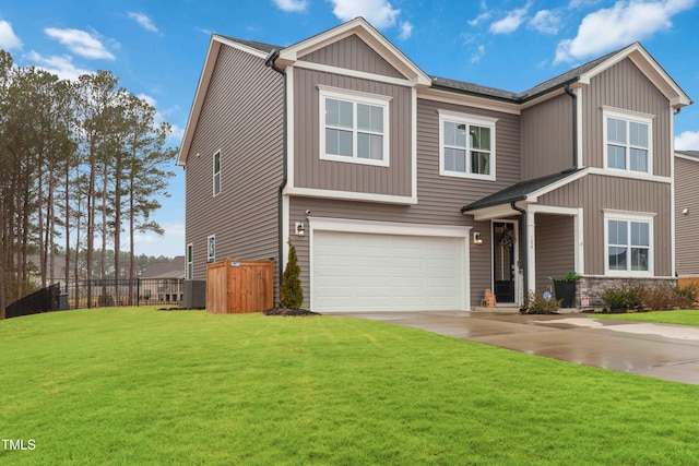 view of front facade featuring a garage and a front yard