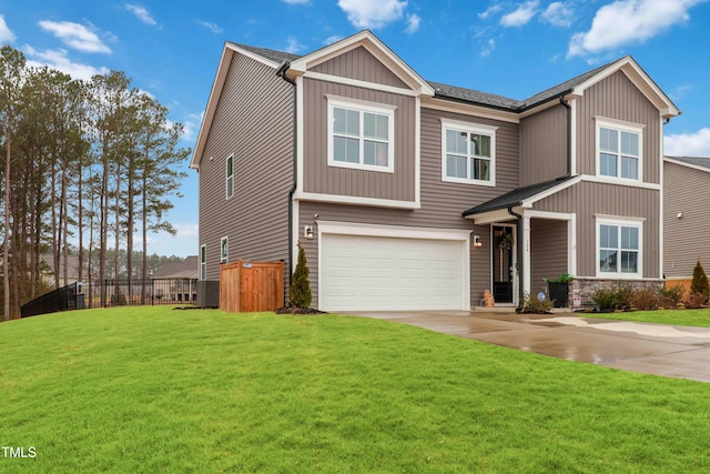 craftsman inspired home featuring a garage and a front lawn