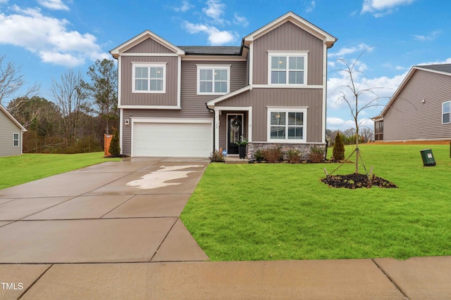 view of front facade featuring a garage and a front yard