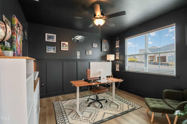 office space featuring ceiling fan and light hardwood / wood-style flooring