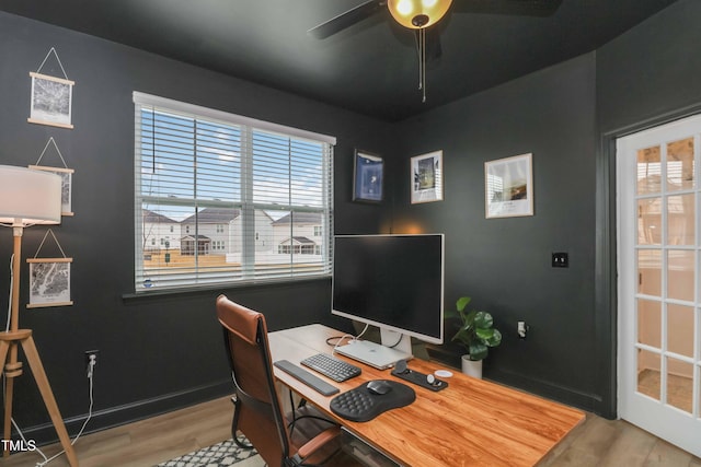 office area featuring ceiling fan and light hardwood / wood-style floors