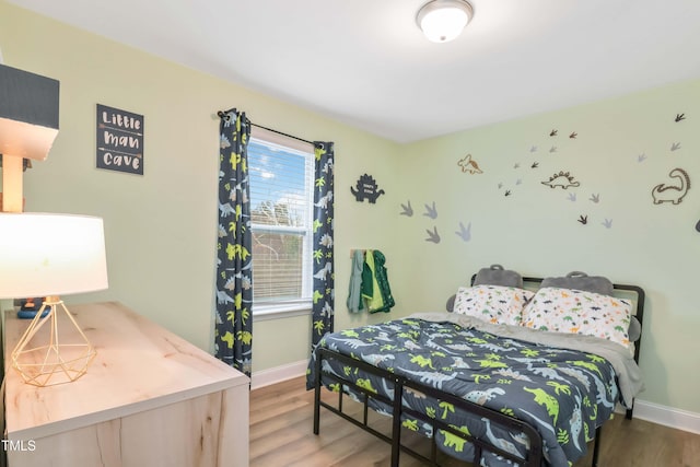 bedroom featuring dark wood-type flooring