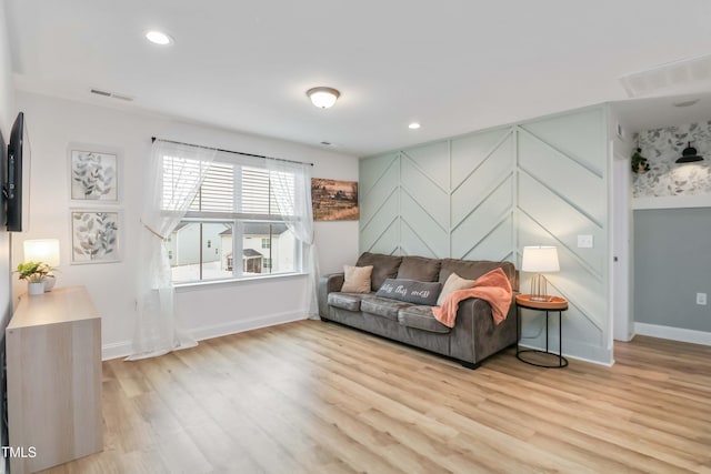 living room featuring light wood-type flooring