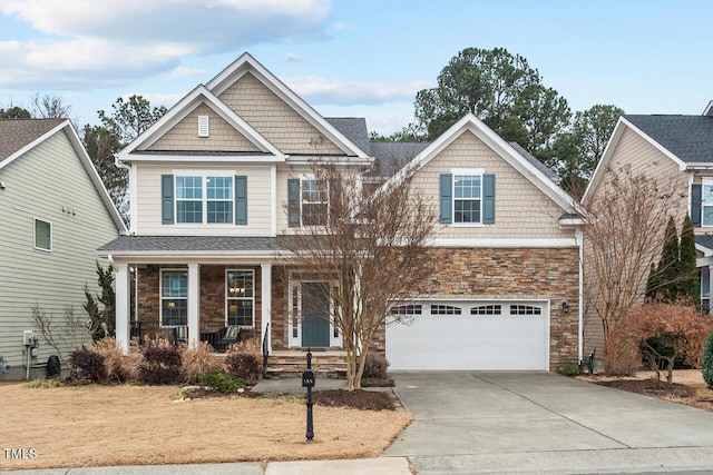 craftsman-style house with a porch and a garage