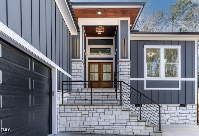 view of exterior entry featuring french doors