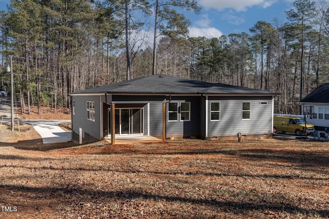 back of property with a patio area