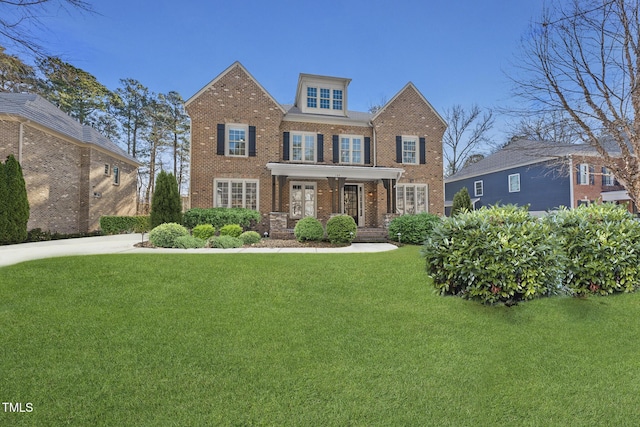 view of front of house with a front lawn