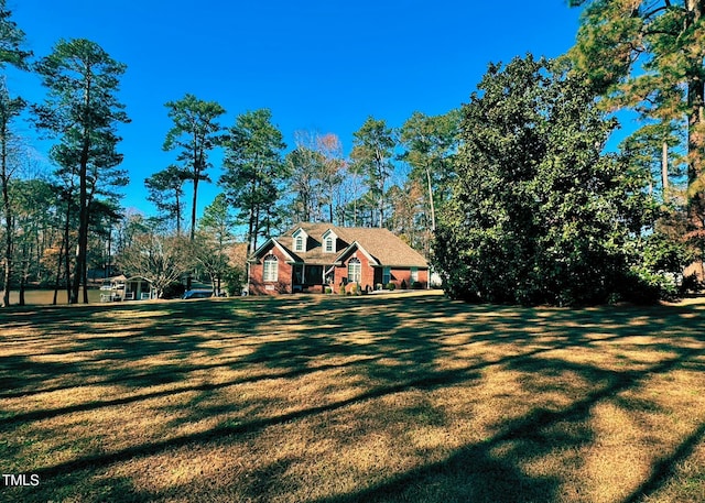 exterior space featuring a front yard