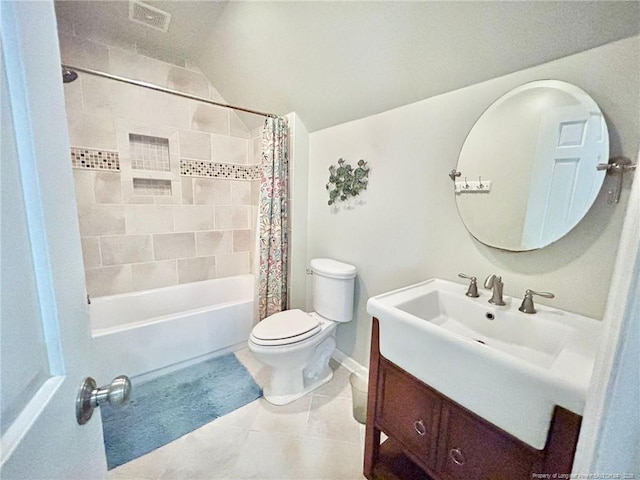 full bathroom with vaulted ceiling, vanity, toilet, shower / bath combo, and tile patterned floors