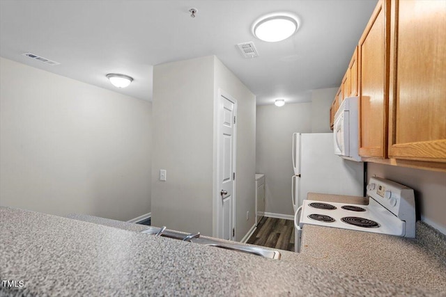 kitchen with sink and white appliances