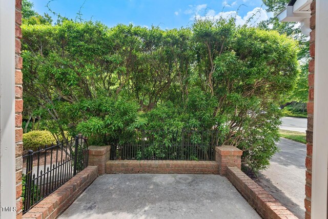 view of patio with fence