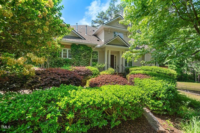 view of front of property with fence