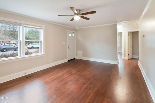 unfurnished room with ceiling fan, crown molding, and dark hardwood / wood-style floors