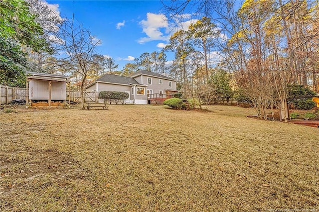 view of yard with a wooden deck