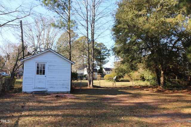 view of outdoor structure with a lawn