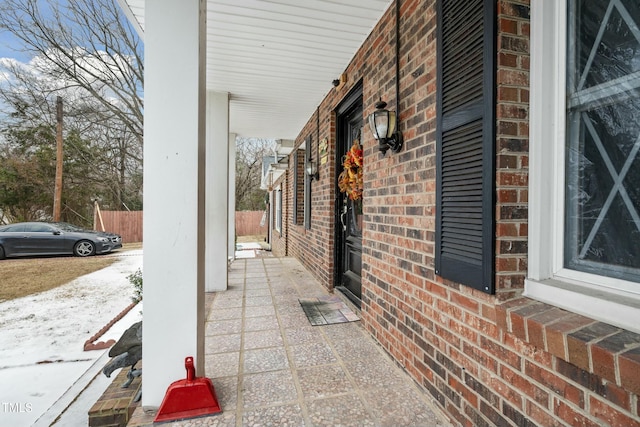 view of snow covered patio