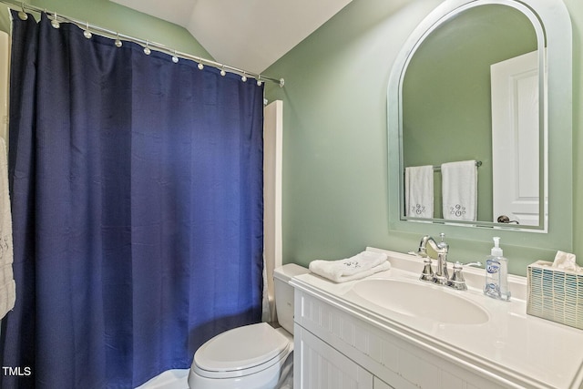 full bathroom with shower / bath combination with curtain, vanity, toilet, and vaulted ceiling