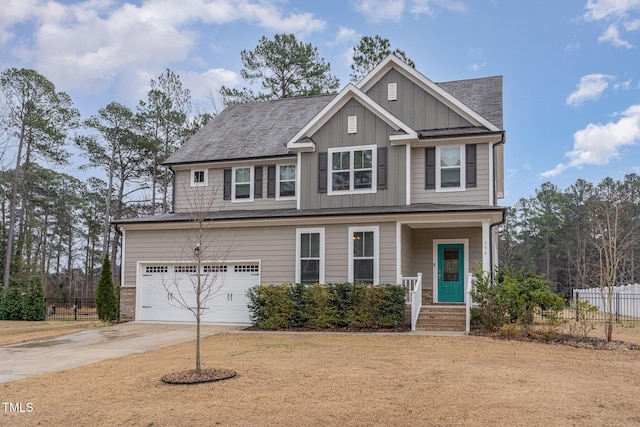 view of front of house with a garage and covered porch