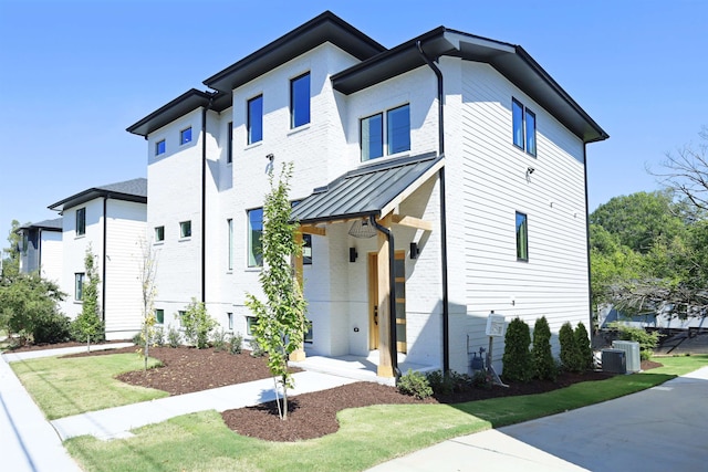 view of front of home with central AC