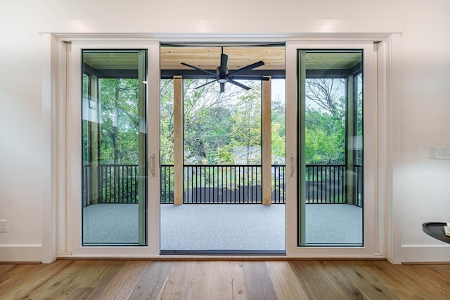 entryway featuring hardwood / wood-style flooring and ceiling fan