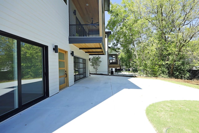 view of patio / terrace featuring ceiling fan