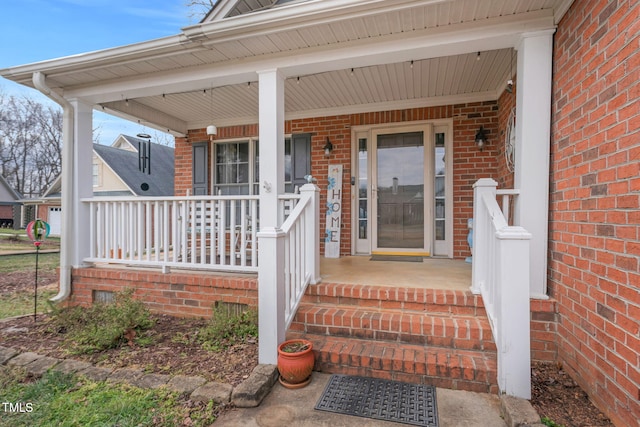 doorway to property featuring a porch