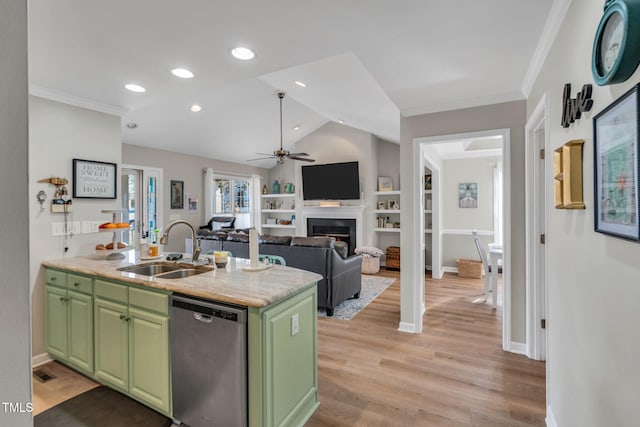 kitchen with lofted ceiling, sink, dishwasher, green cabinets, and ceiling fan