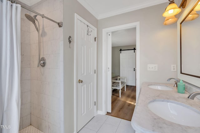 bathroom with tile patterned floors, ornamental molding, a shower with shower curtain, and vanity