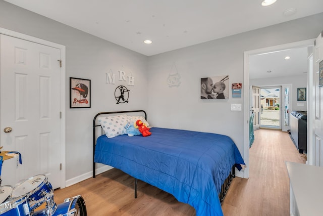 bedroom featuring light hardwood / wood-style flooring