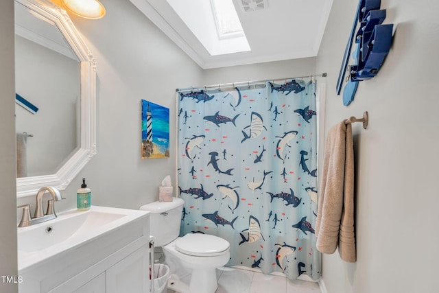 bathroom featuring vanity, a skylight, and ornamental molding