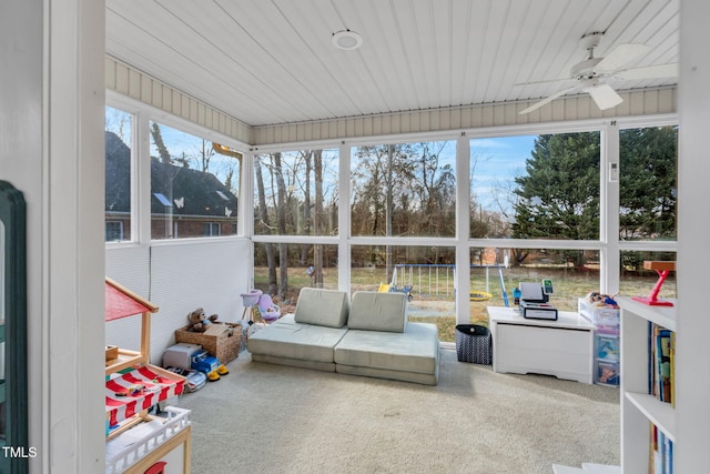 sunroom / solarium with ceiling fan