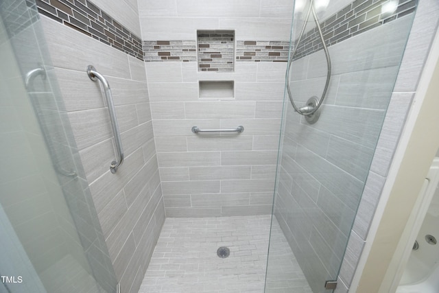 bathroom with a stall shower