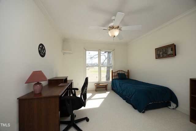 carpeted bedroom with a ceiling fan and ornamental molding