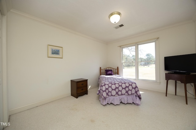 carpeted bedroom with baseboards, visible vents, and ornamental molding