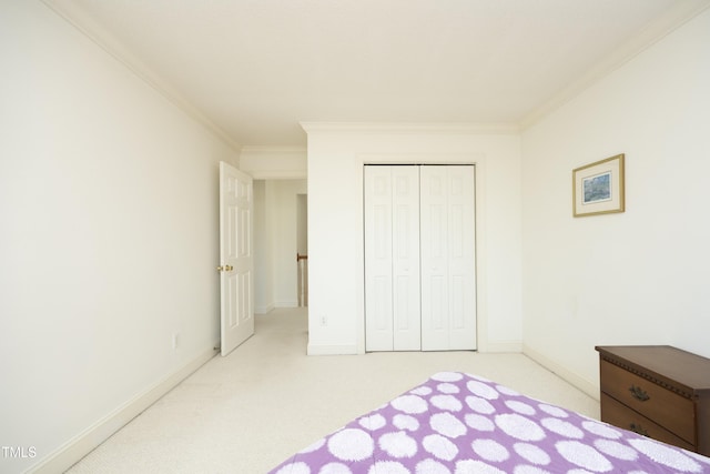 bedroom featuring baseboards, light carpet, and ornamental molding