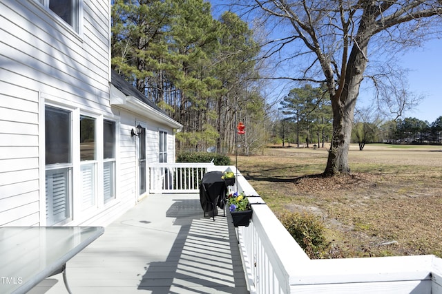 wooden deck with area for grilling