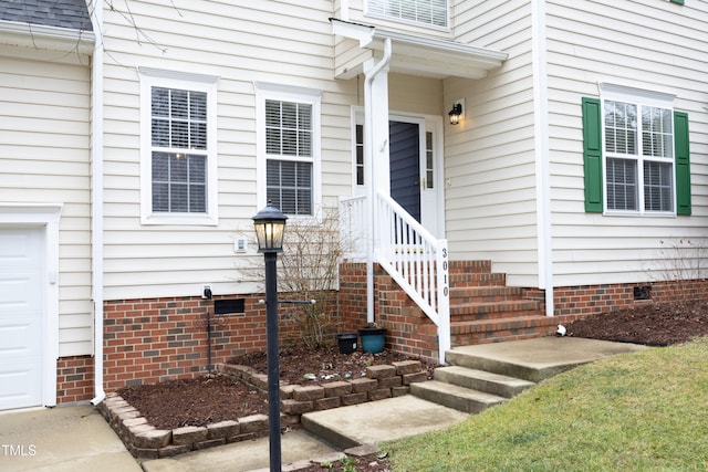 property entrance featuring a garage