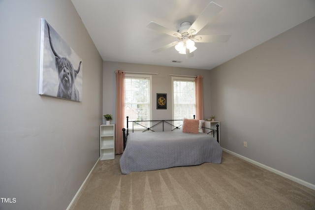 bedroom featuring ceiling fan and carpet floors