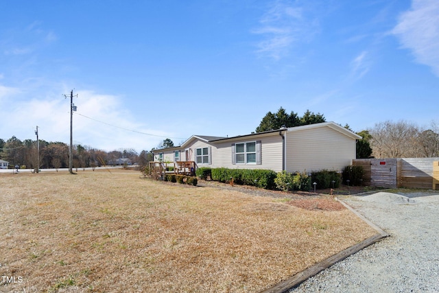 view of front of home with a front lawn