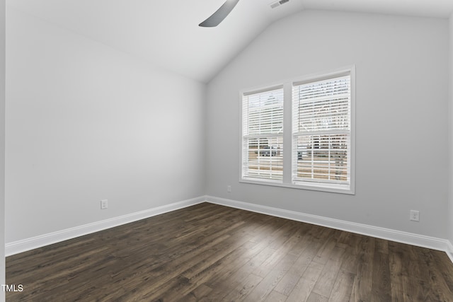 unfurnished room featuring lofted ceiling, dark hardwood / wood-style floors, and ceiling fan