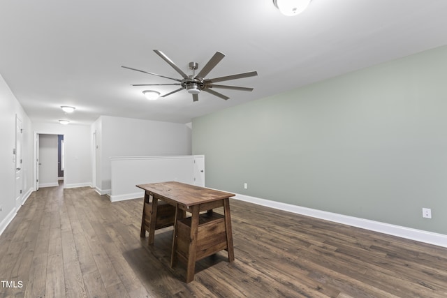 dining room featuring ceiling fan and dark hardwood / wood-style floors