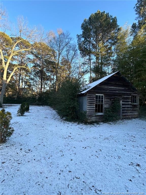 view of yard covered in snow