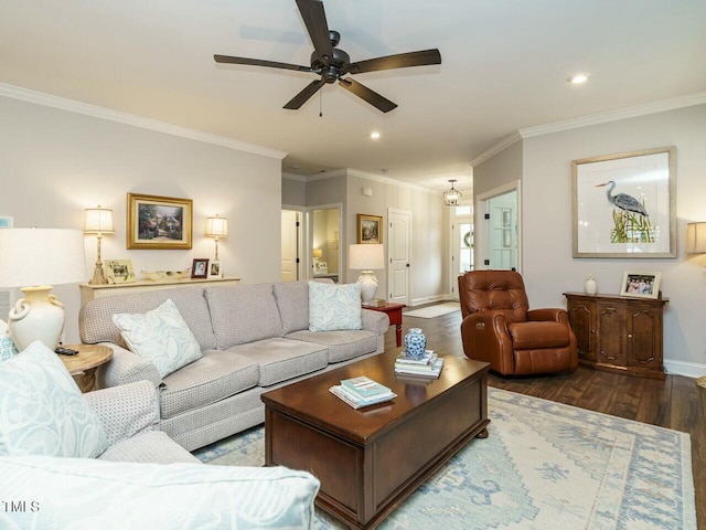 living room featuring crown molding, dark hardwood / wood-style floors, and ceiling fan