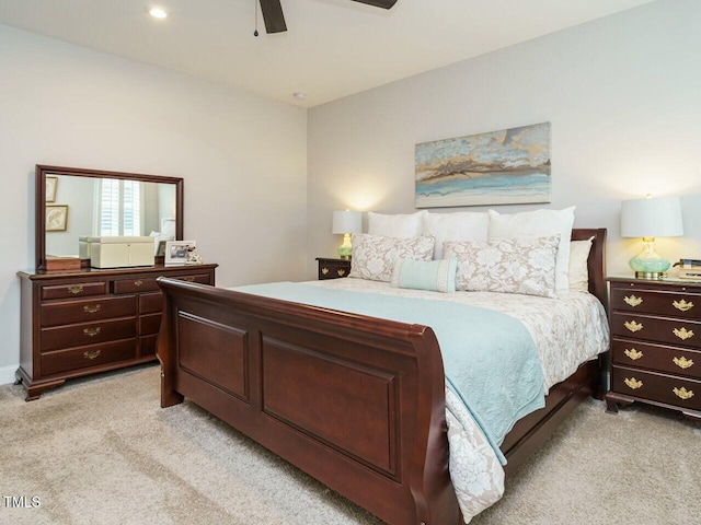 bedroom with light colored carpet and ceiling fan