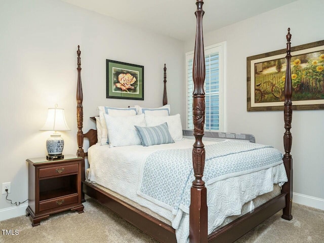 bedroom with light carpet