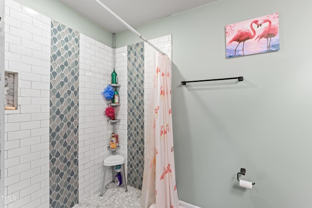 bathroom featuring walk in shower