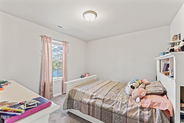 bedroom with light carpet