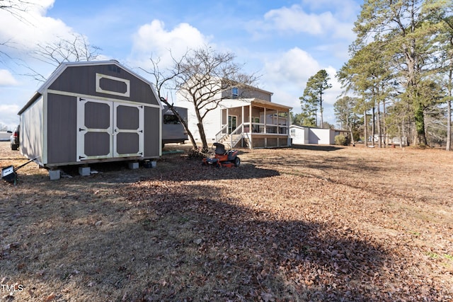 exterior space featuring a storage shed